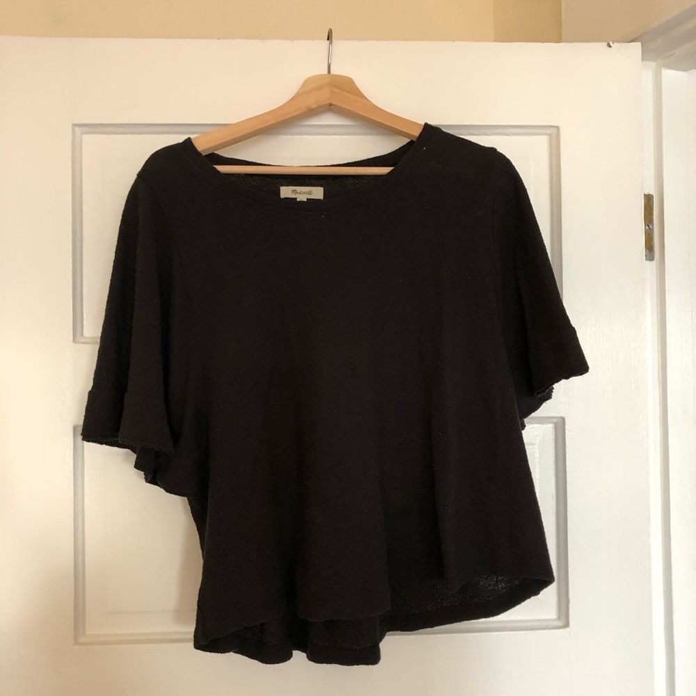 Black flutter sleeve top from Madewell.